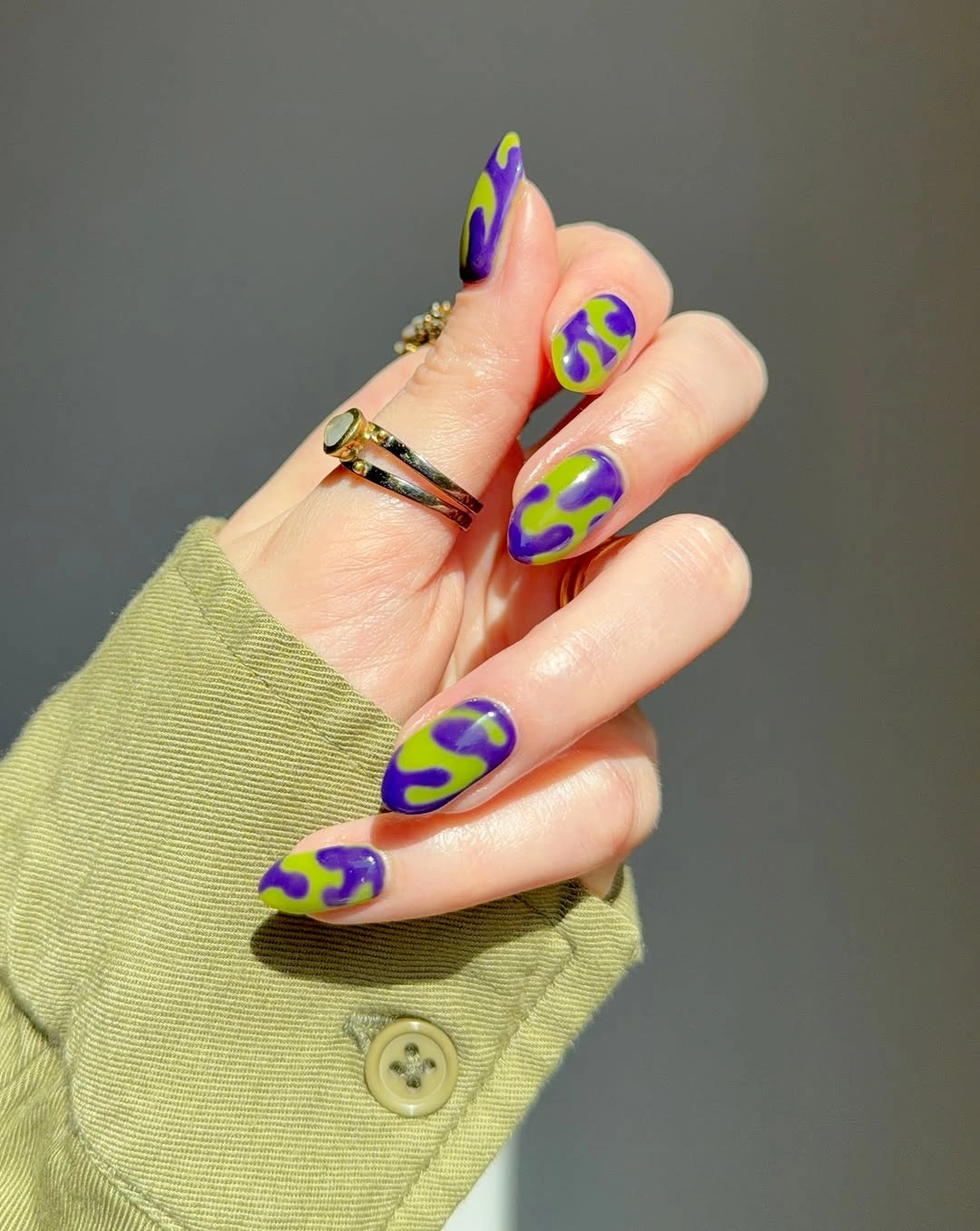 September nail designs 2026 Purple And Yellow Abstract Swirls On Long Almond Nails