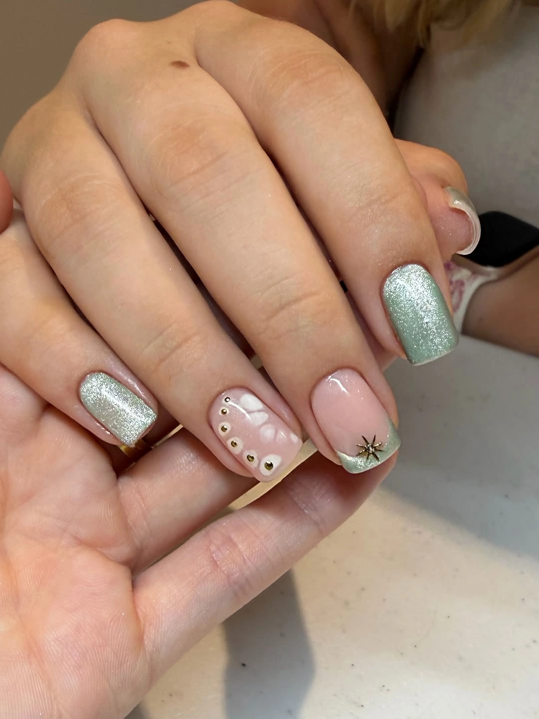 September nail designs 2026 Silver Glitter Nails With Nude Botanical Accents