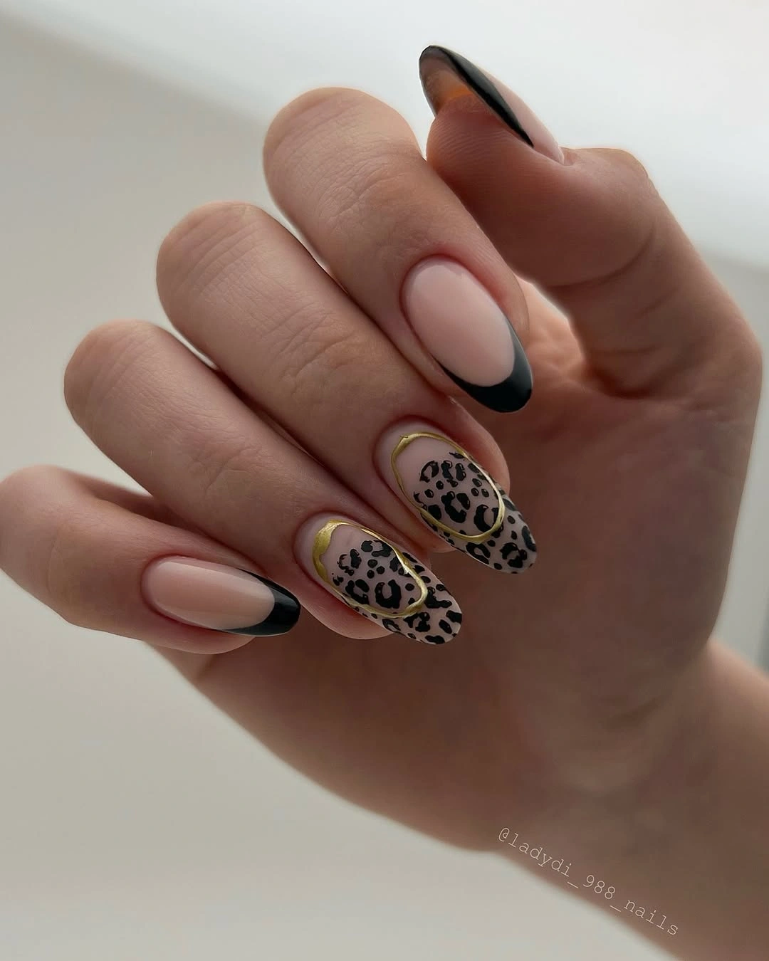 September nail designs 2026 Nude Nails With Leopard Spots And Black French Edges