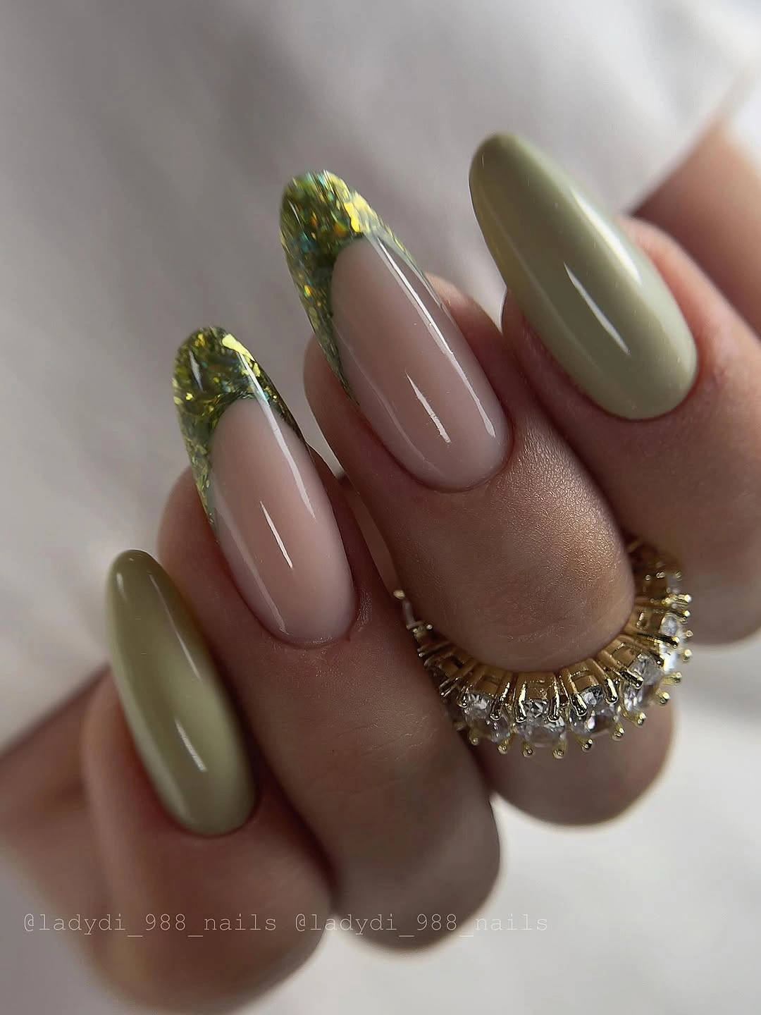 September nails color 2026 Olive Almond Nails With Glitter French Tips