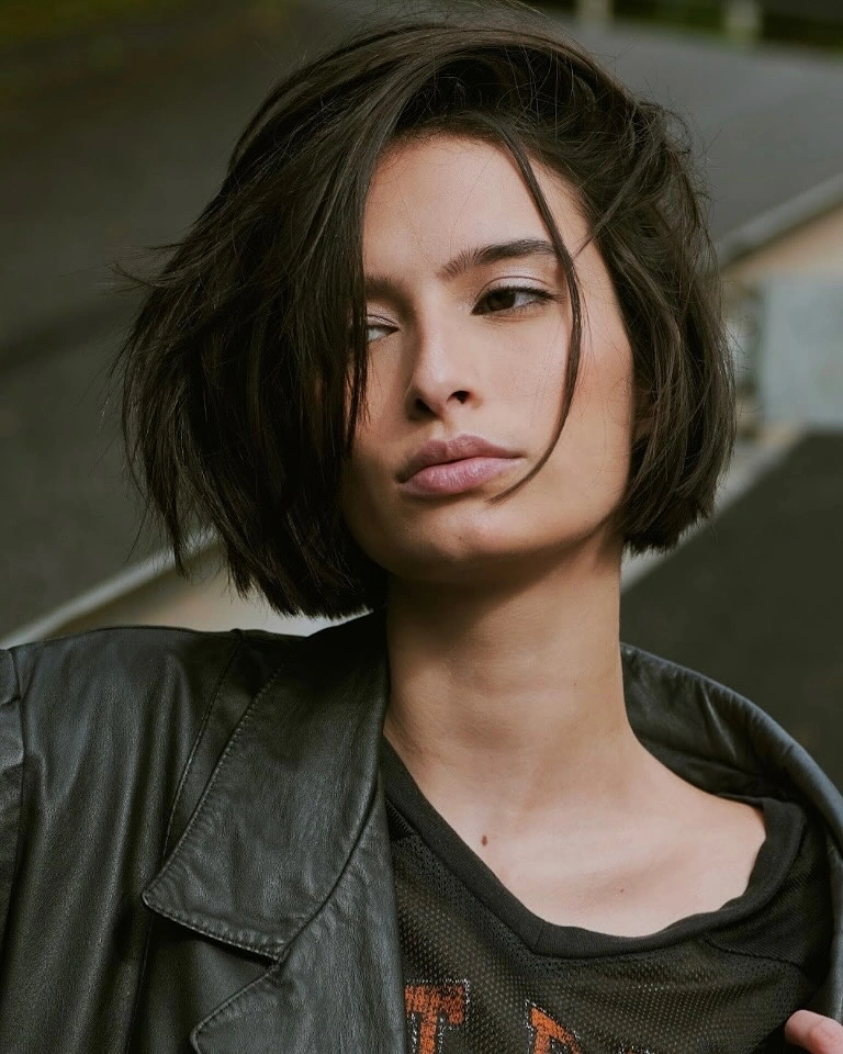 short bobbed hairstyle Tousled Dark Bob With Side-Swept Volume