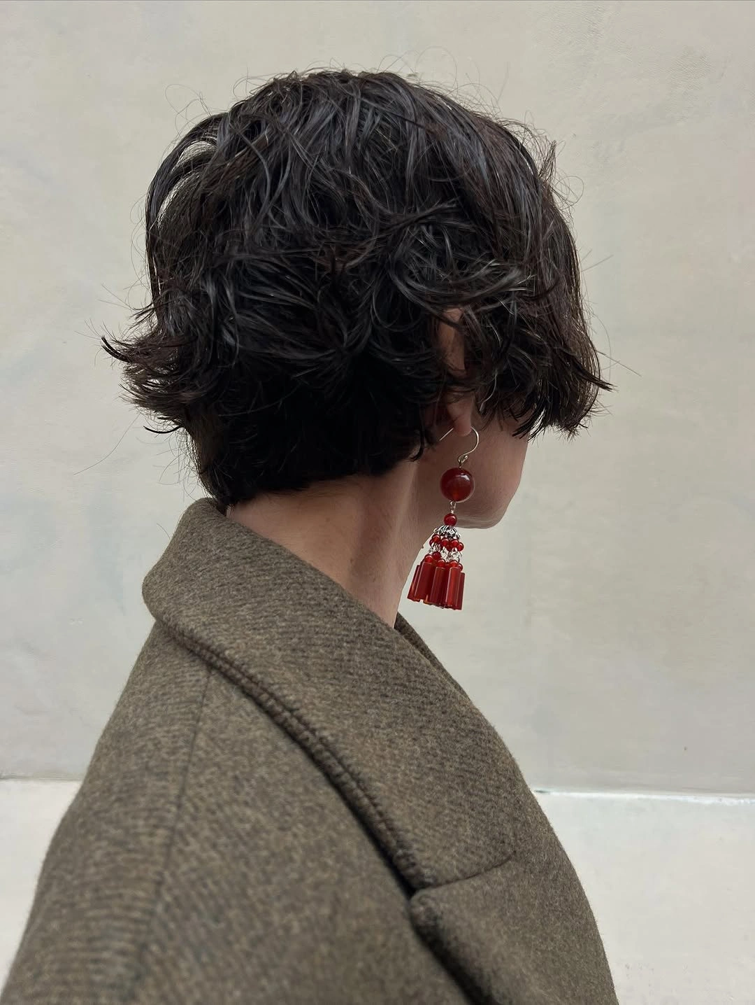 short bobbed hairstyle Wet-Look Curly Bob With Flipped Ends