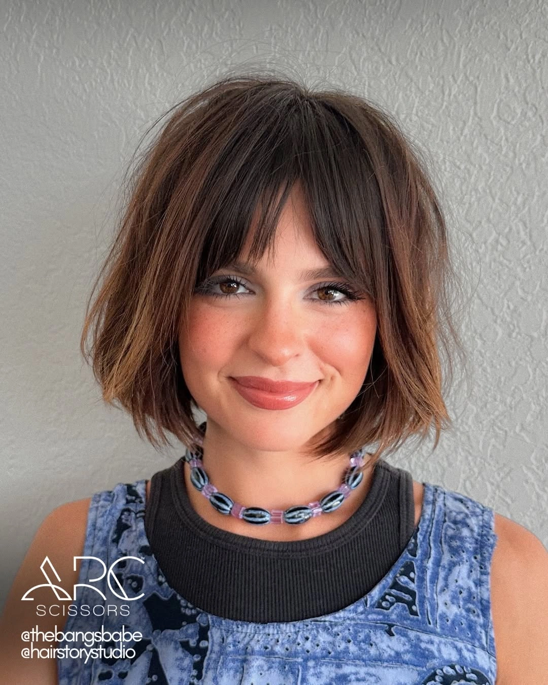 short bobbed hairstyle Soft Brown Bob With Curtain Bangs