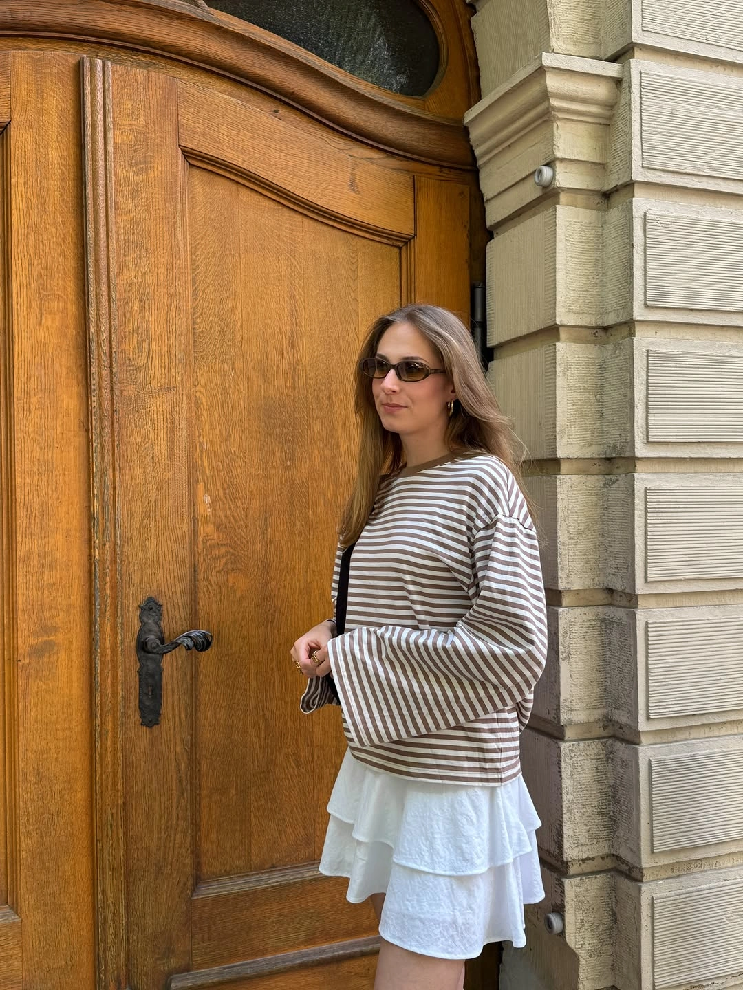 what are must-have fall outfits for 2026 Striped Tops and Feminine Mini Skirts Create the Perfect Early Fall Balance