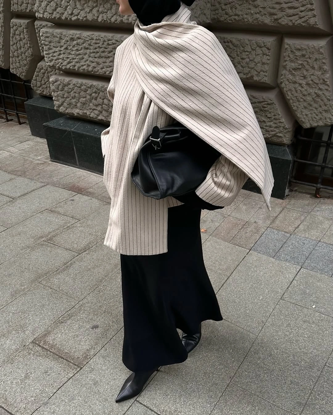 what are must-have fall outfits for 2026 Oversized Knit Wraps Bring Quiet Luxury Into Everyday Dressing