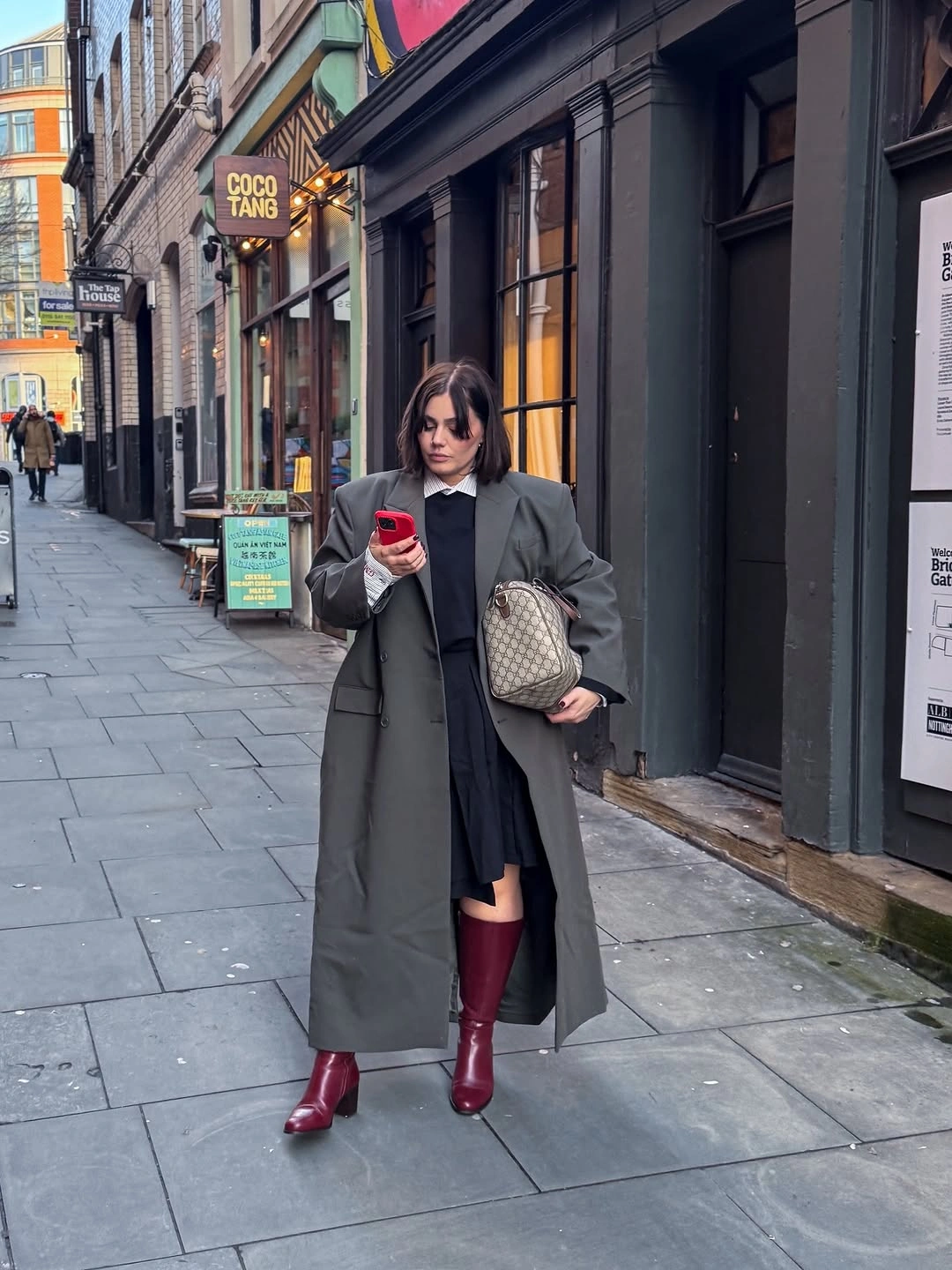 what are must-have fall outfits for 2026 Oversized Coats and Burgundy Boots Add Drama to City Dressing