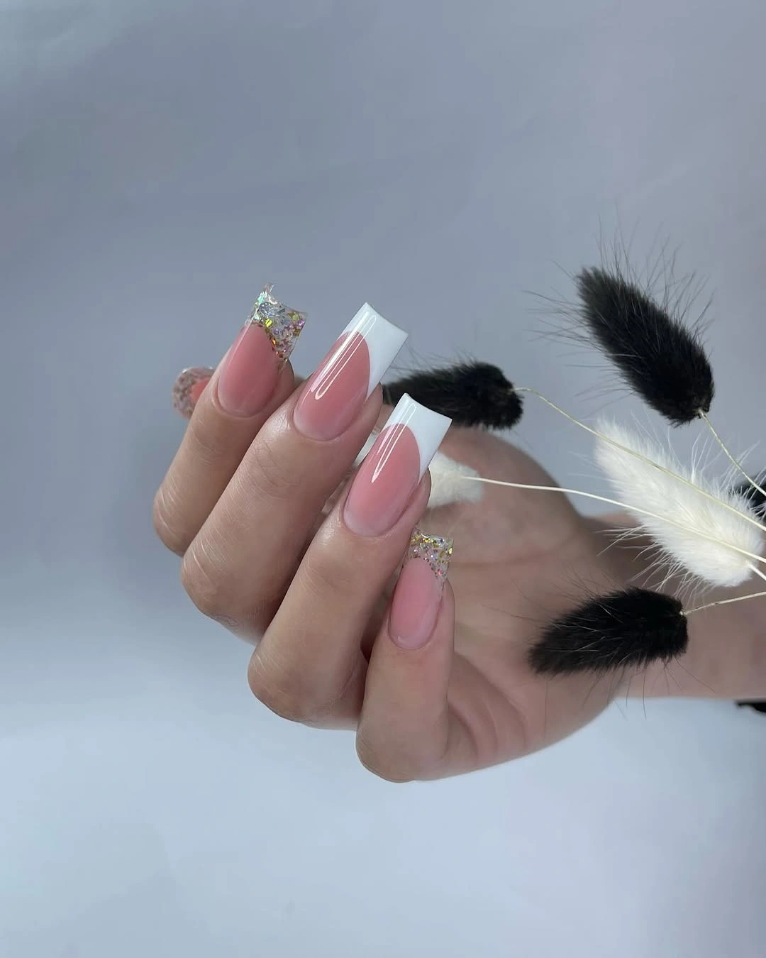 Long pink square nails with white and cool reflective tips