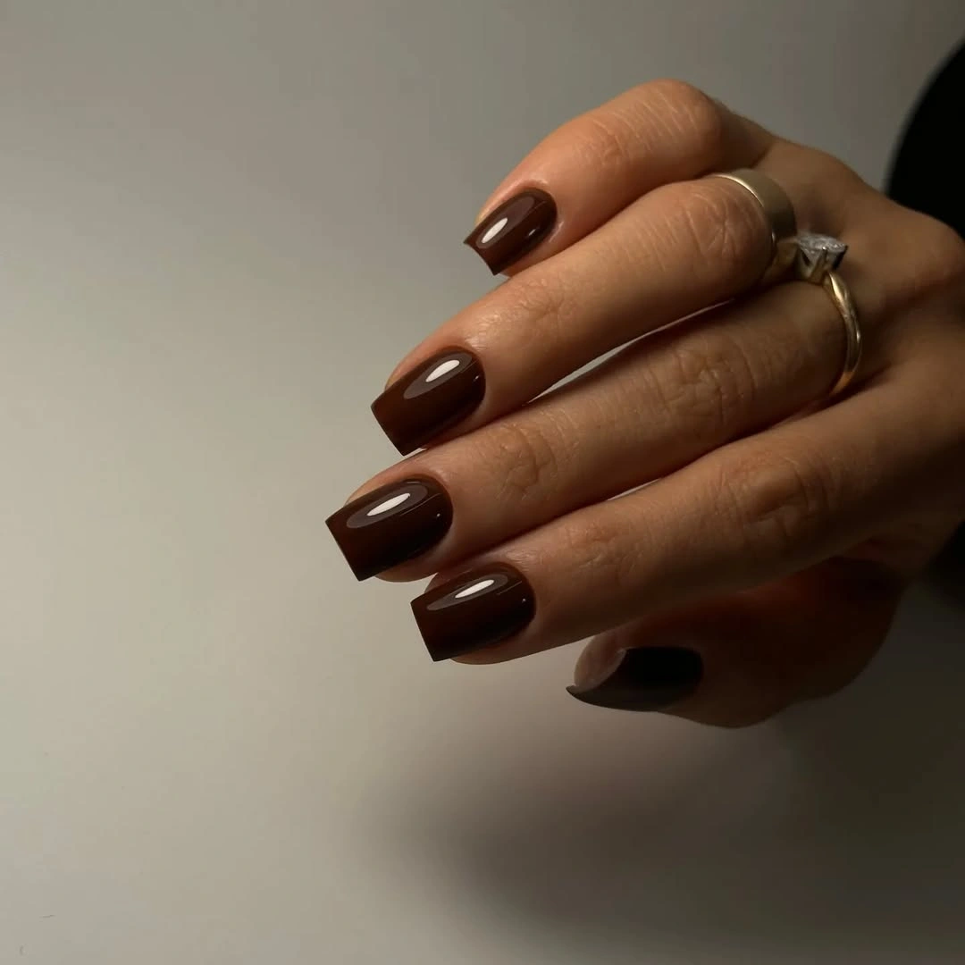 short square espresso nails with brown glitter accents