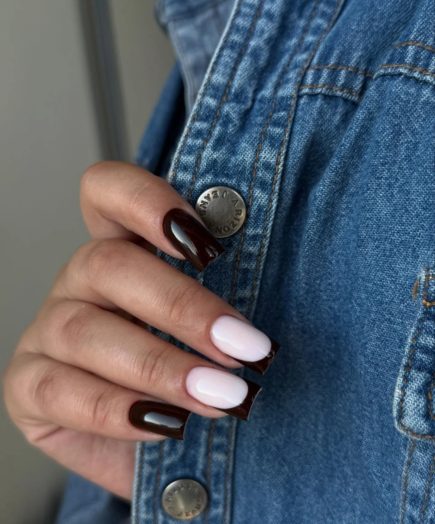 short square brown and white nails with gold accents