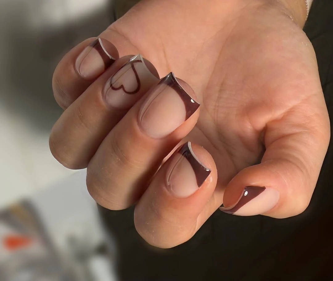 medium almond nails painted smooth deep chocolate brown