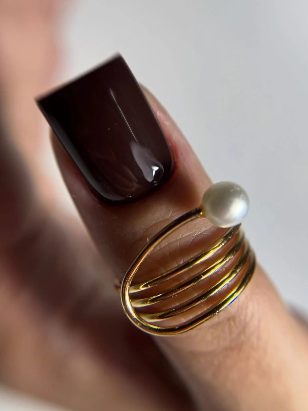 medium square nails mixing deep brown and cool taupe
