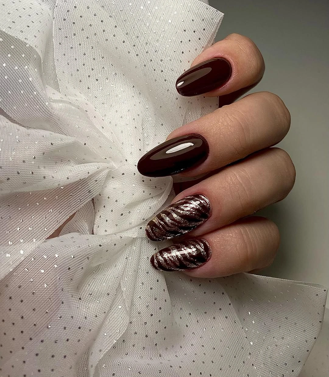 long almond burgundy brown nails with copper line accents