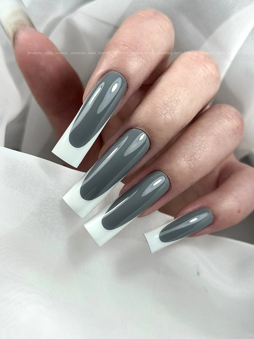Long square charcoal gray nails with reflective highlights