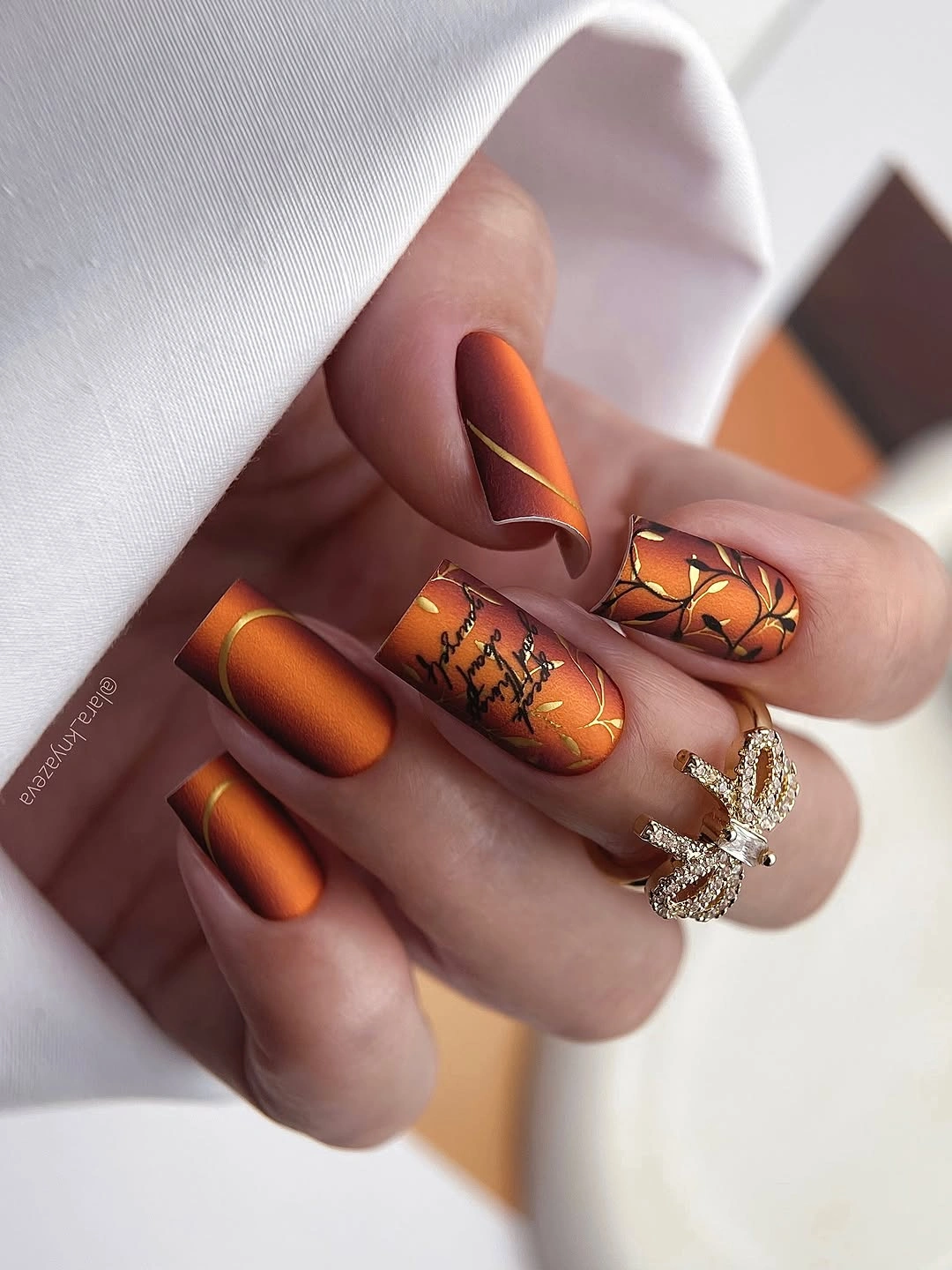 Long square copper nails with diagonal lines and dark accents