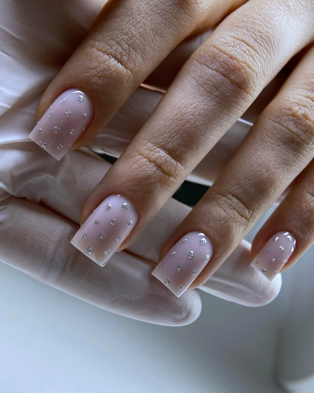 Medium square sheer pink nails with tiny silver points