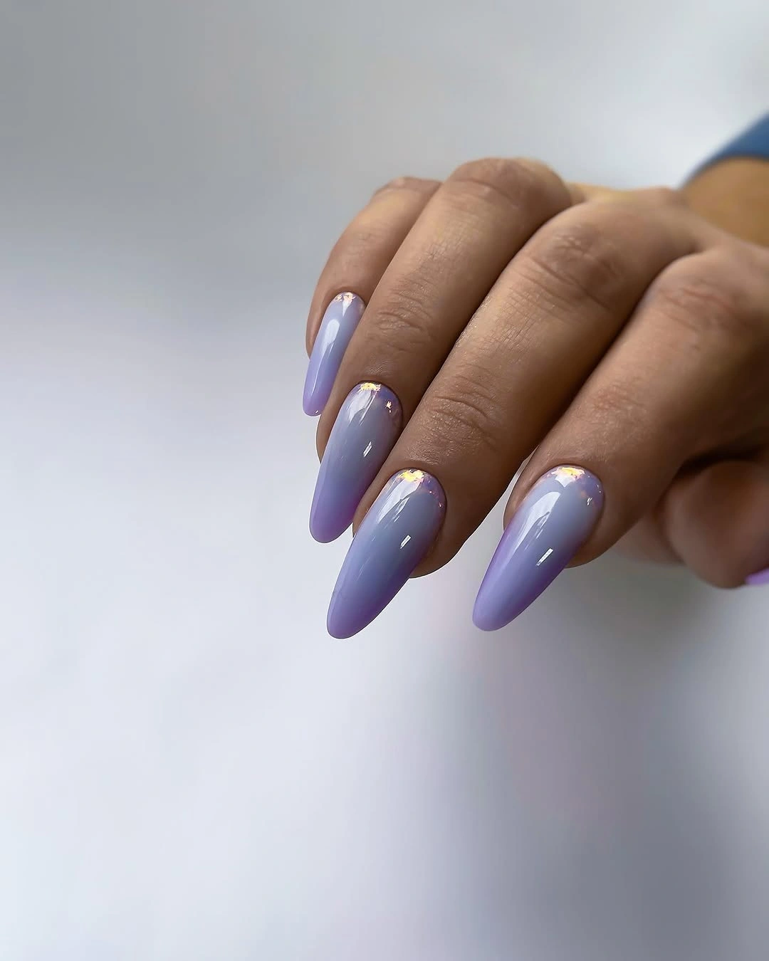 Lavender blue almond nails with gold cuticle accents