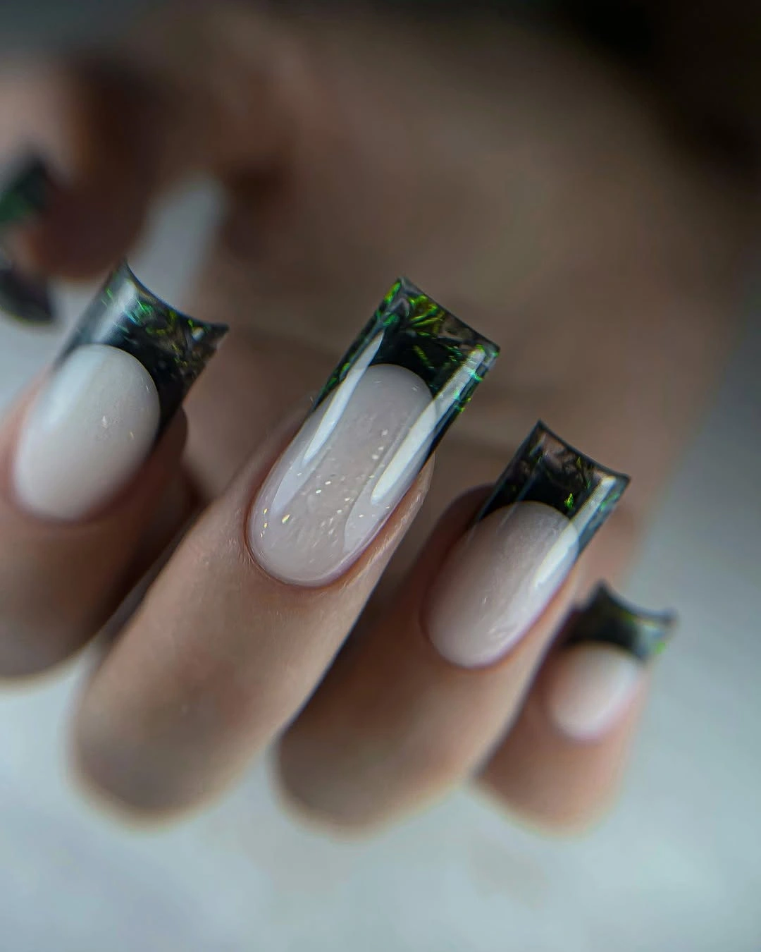Nude square nails with black glass French tips
