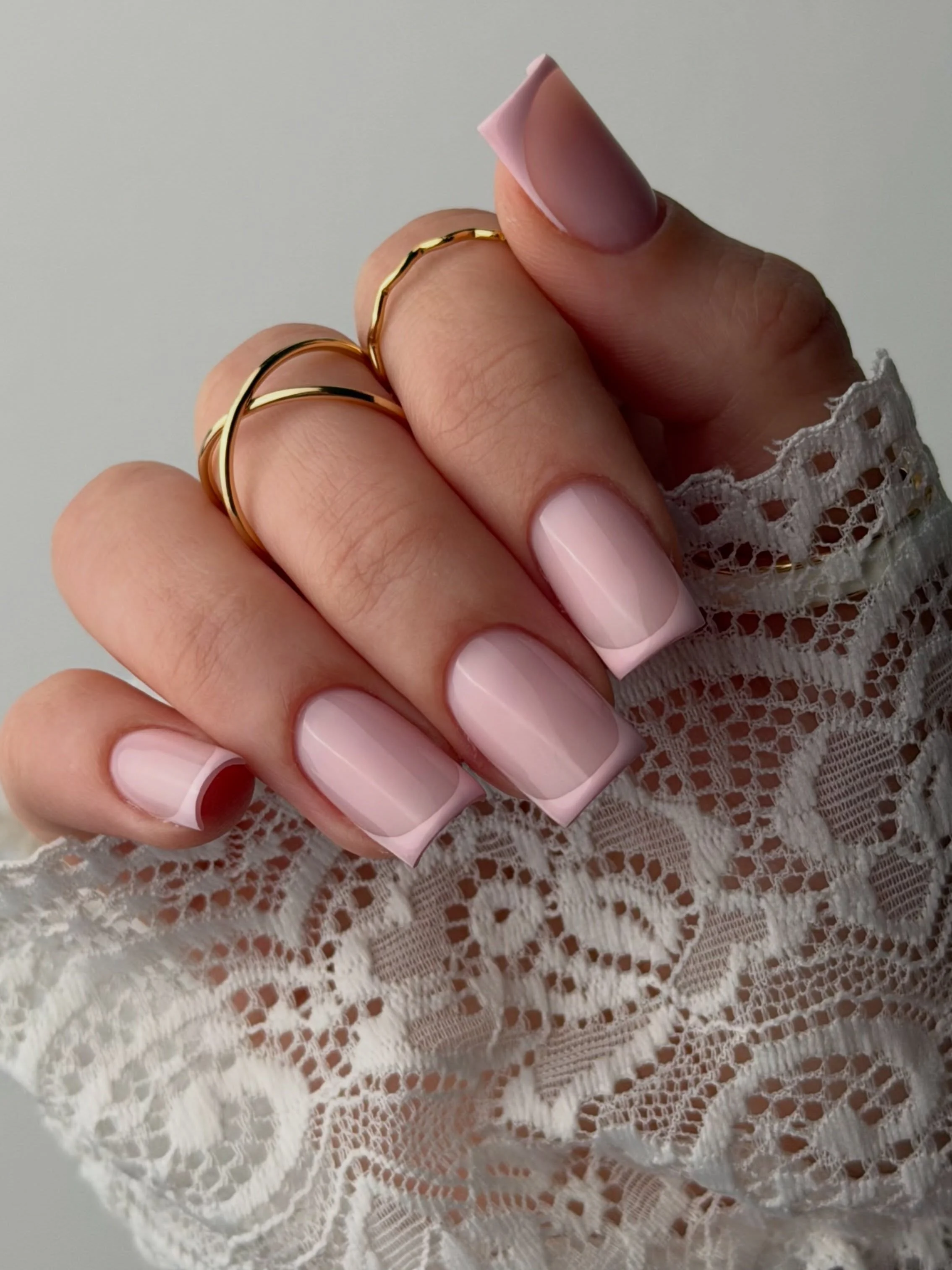 Soft pink square nails with pale French tips
