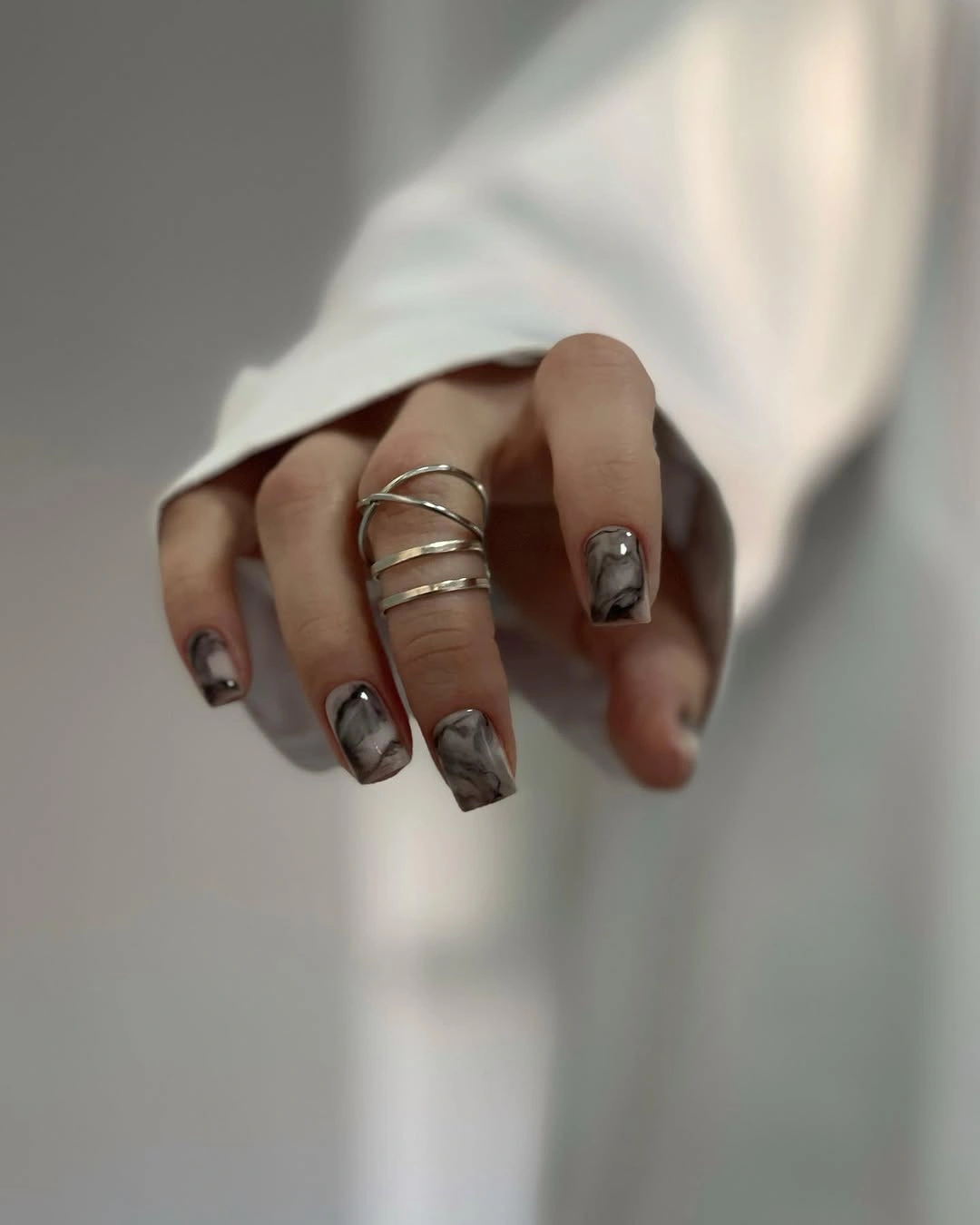 Short square nails with smoky gray black marble
