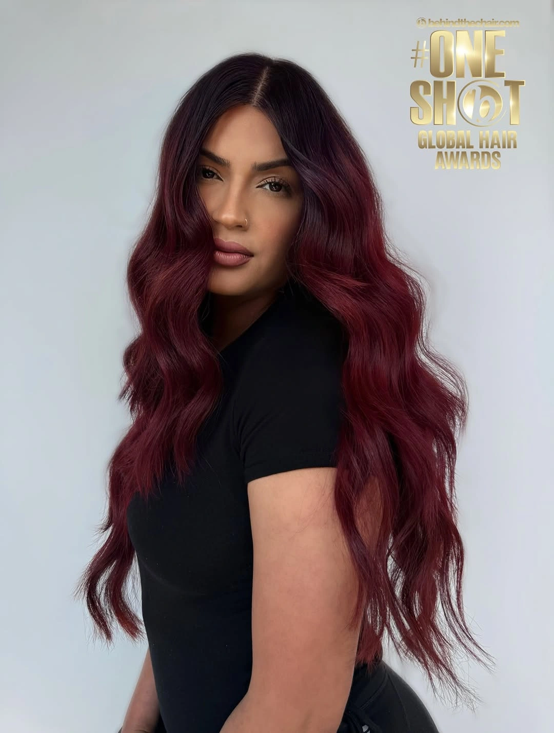 Long dark chocolate hair with large face framing waves