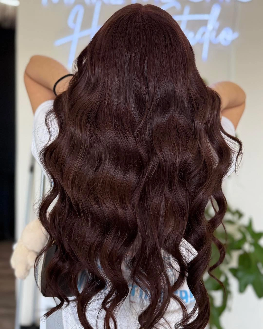 Long red brown hair in defined flowing waves