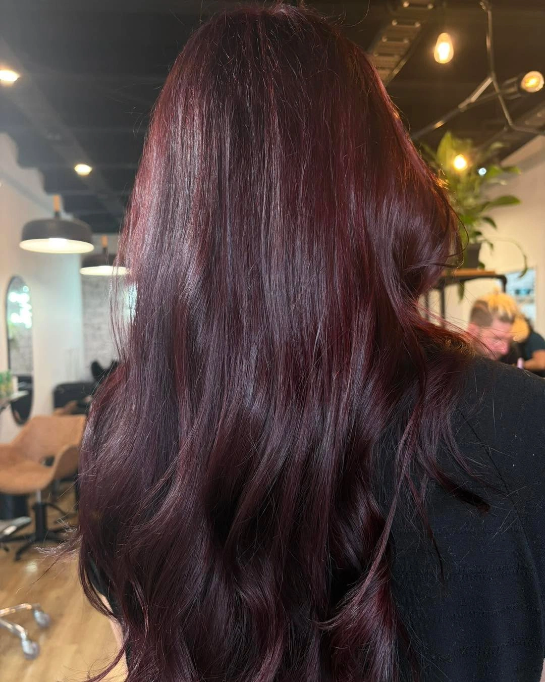 Long cool brunette hair with softly separated brown highlights
