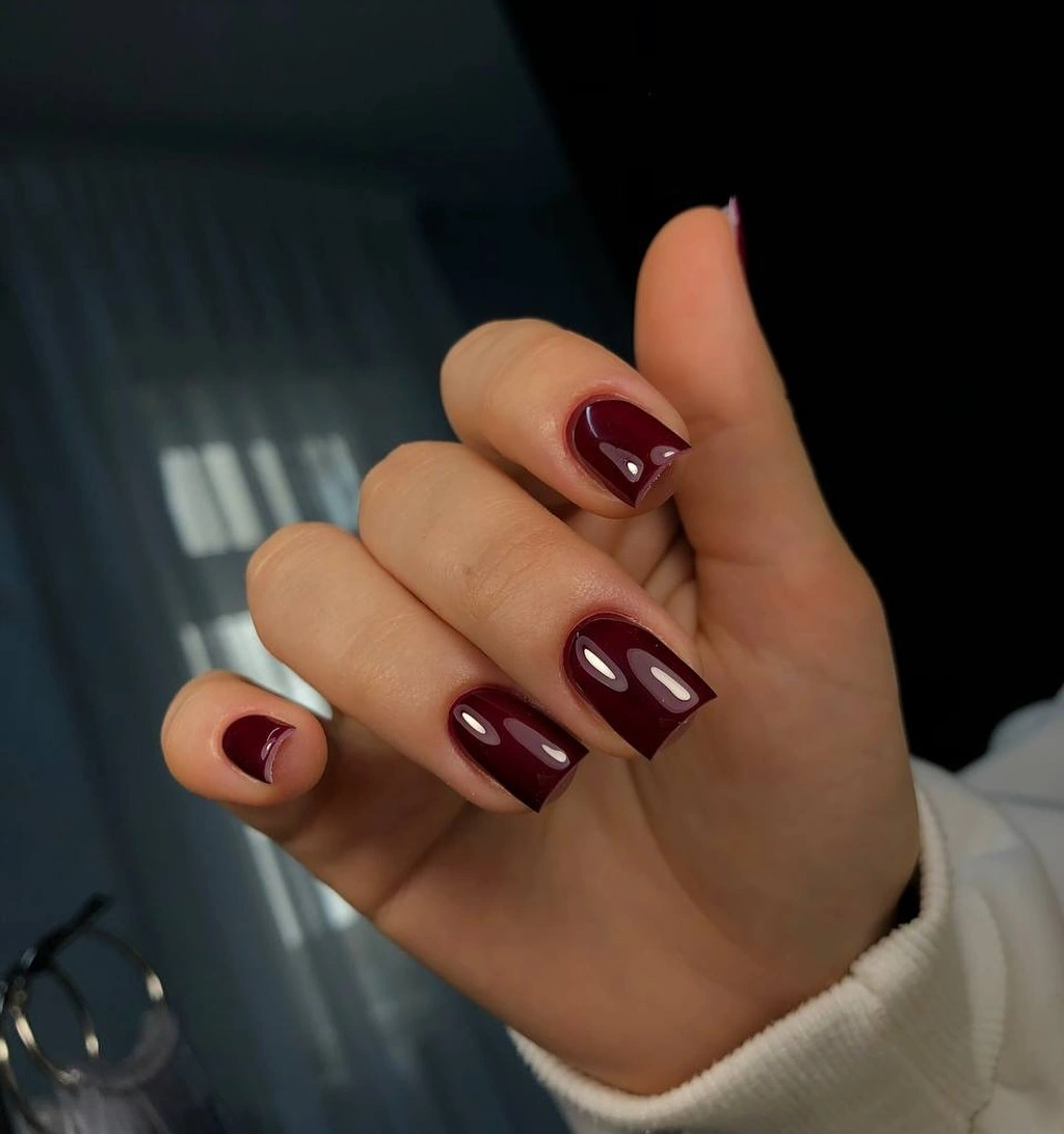 Short coffin nails in a deep glossy burgundy finish