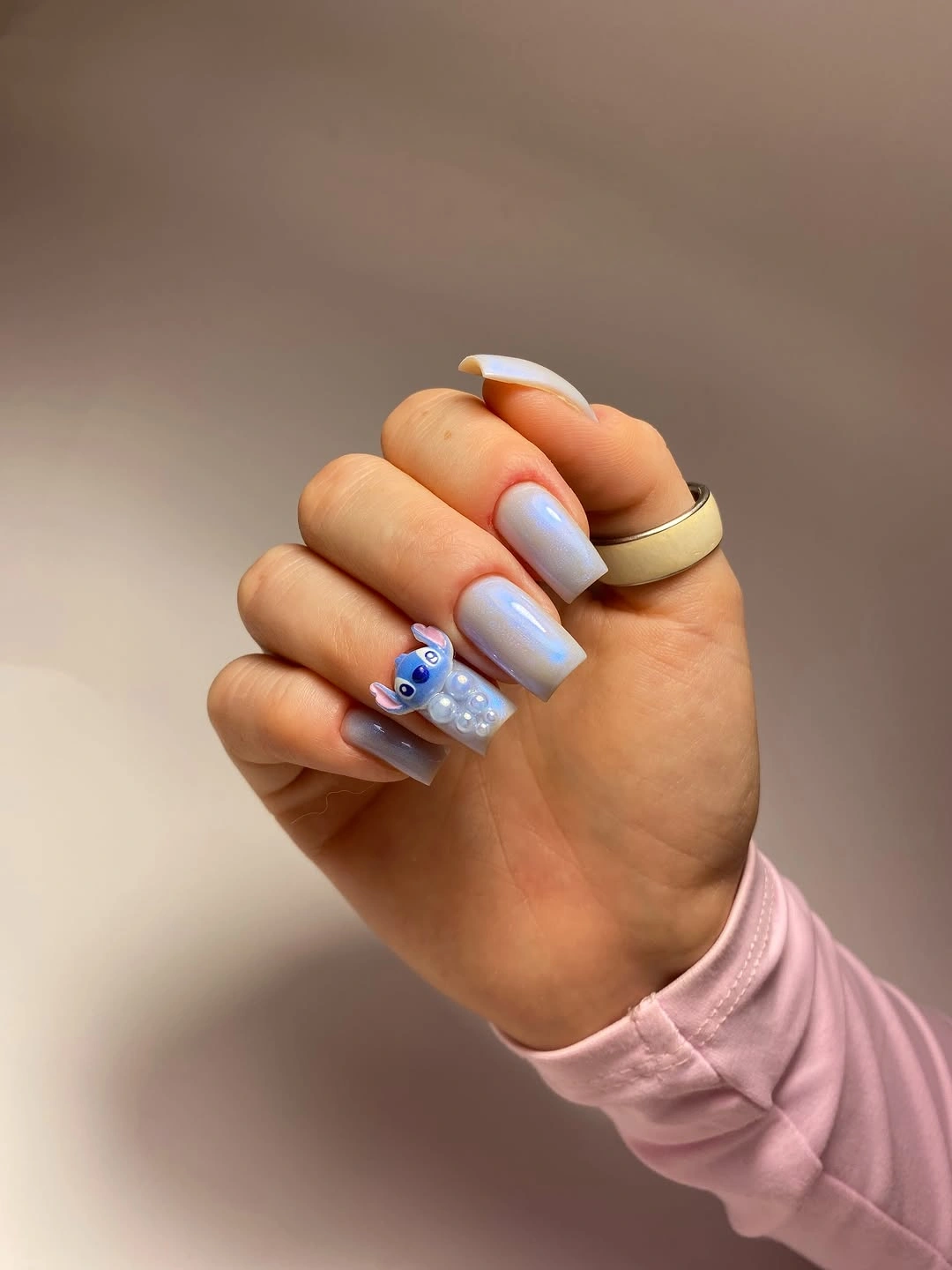 Medium square pale blue nails with one blue accent detail