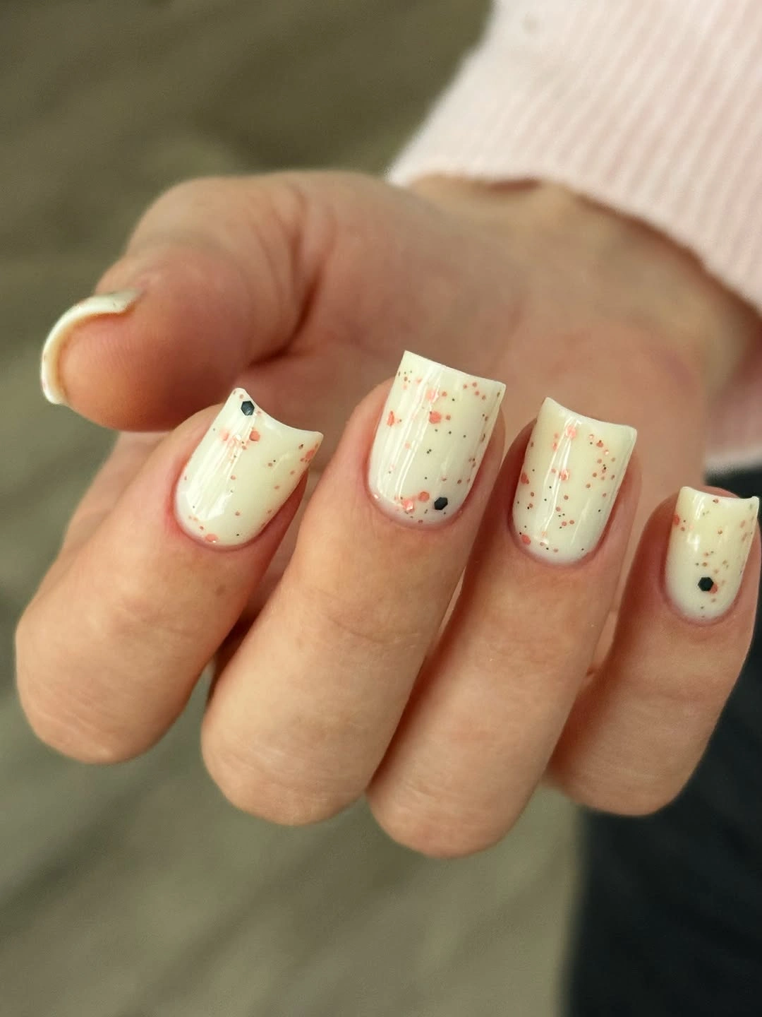 Medium square ivory nails with colorful fall flecks