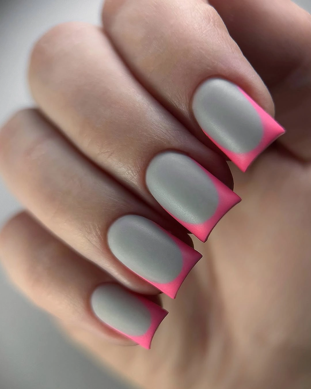 Matte gray square nails with vivid hot pink French tips