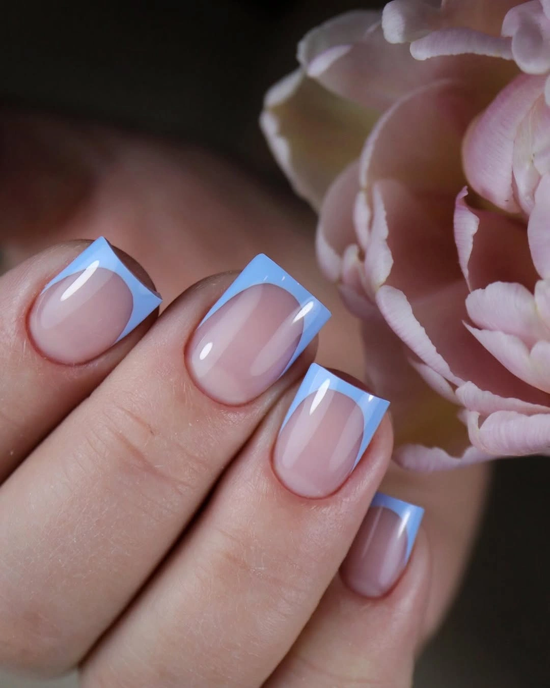 Soft pink square nails with light blue French tips