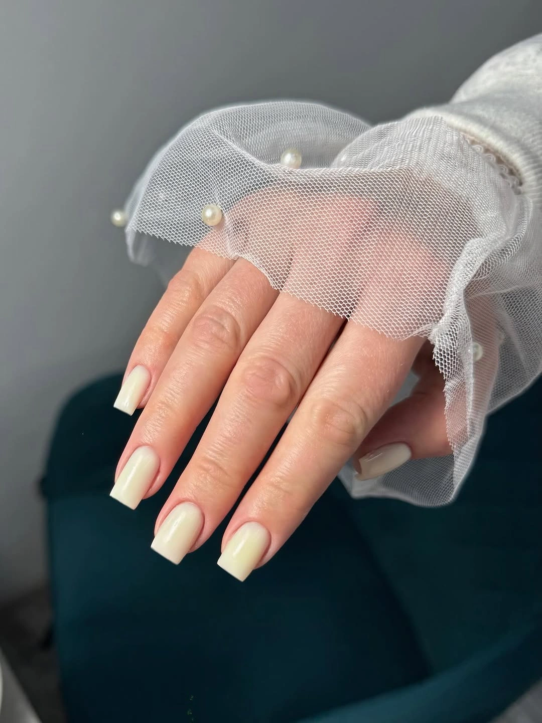 Long square milky nails with clean white French tips