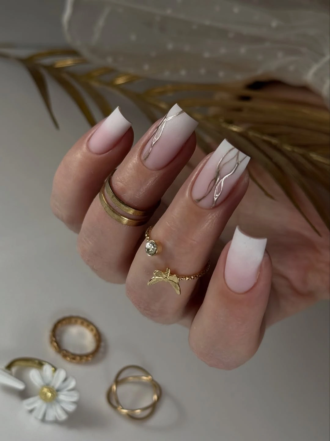 Medium coffin French nails with fine gray curved lines