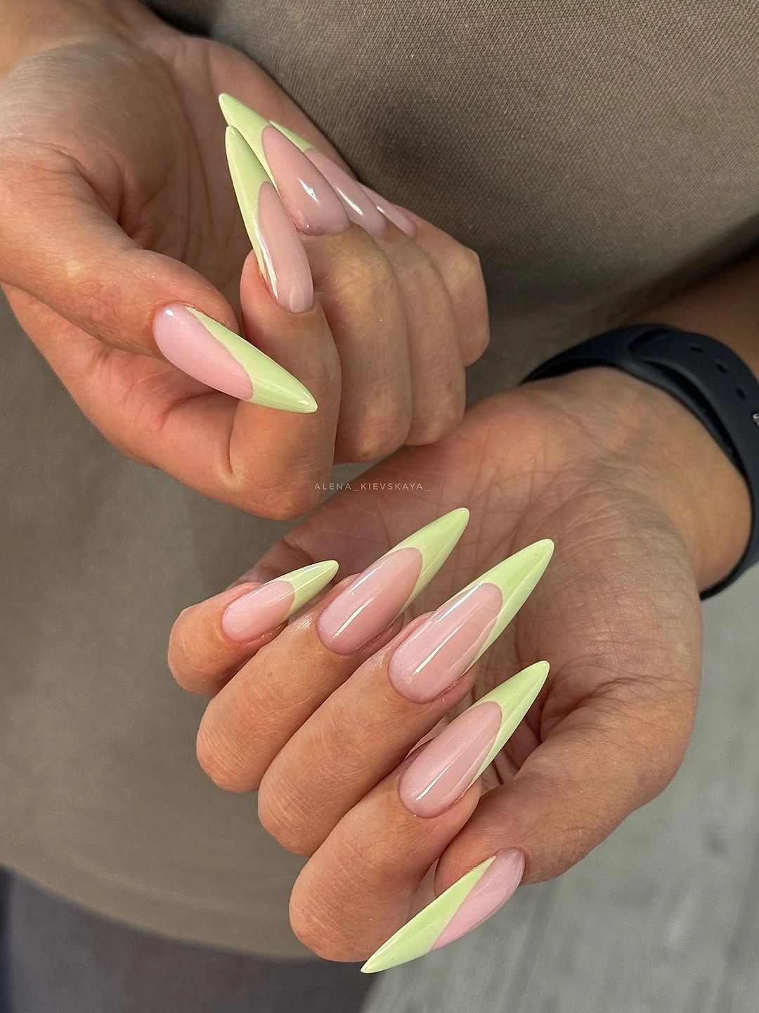 Long pink almond nails with bright lime green side panels