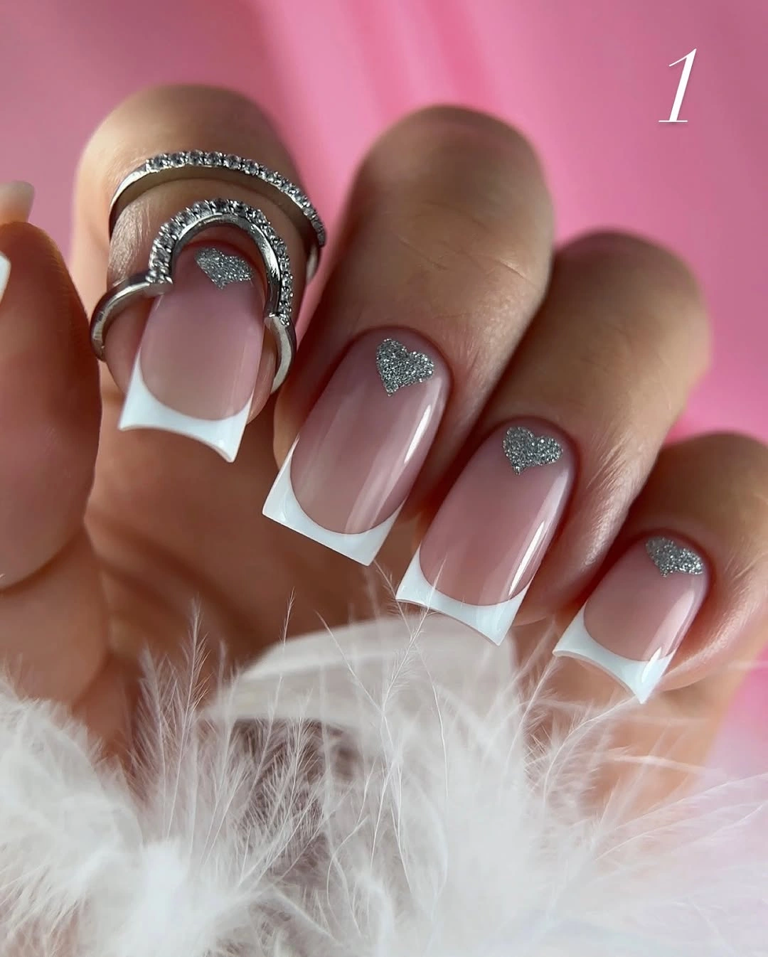 Short blush square nails with white tips and silver glitter