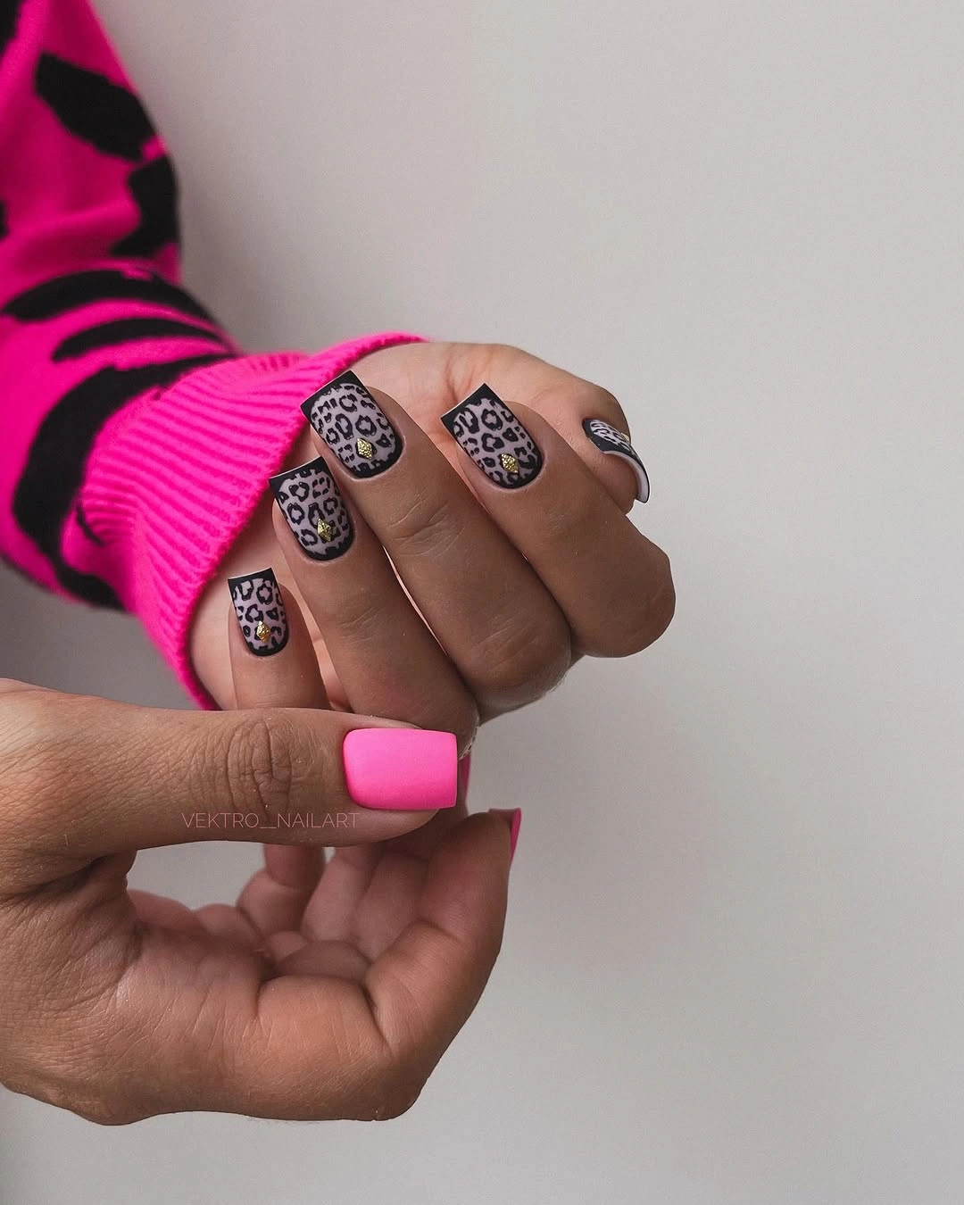Medium square nails with hot pink and spotted accent panels