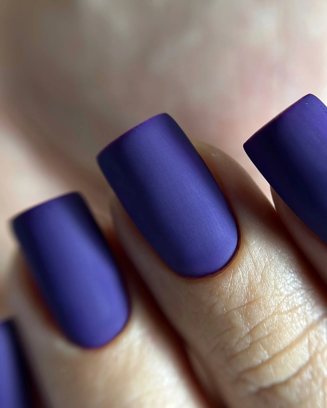deep indigo violet matte nails on a medium square silhouette