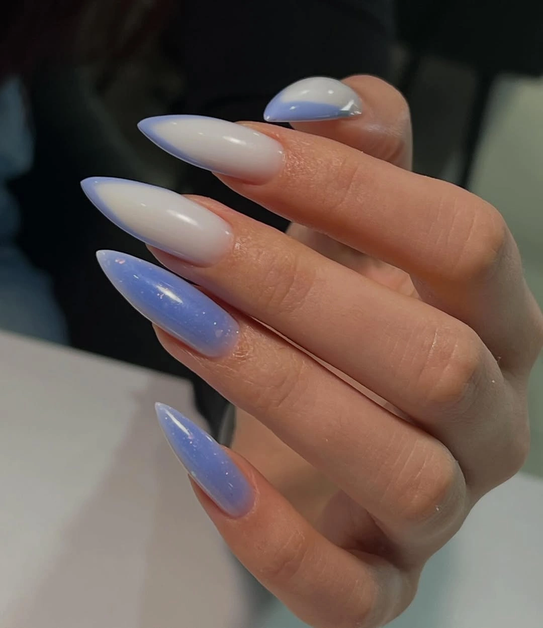 Long almond milky nails with softly blended lavender blue tips