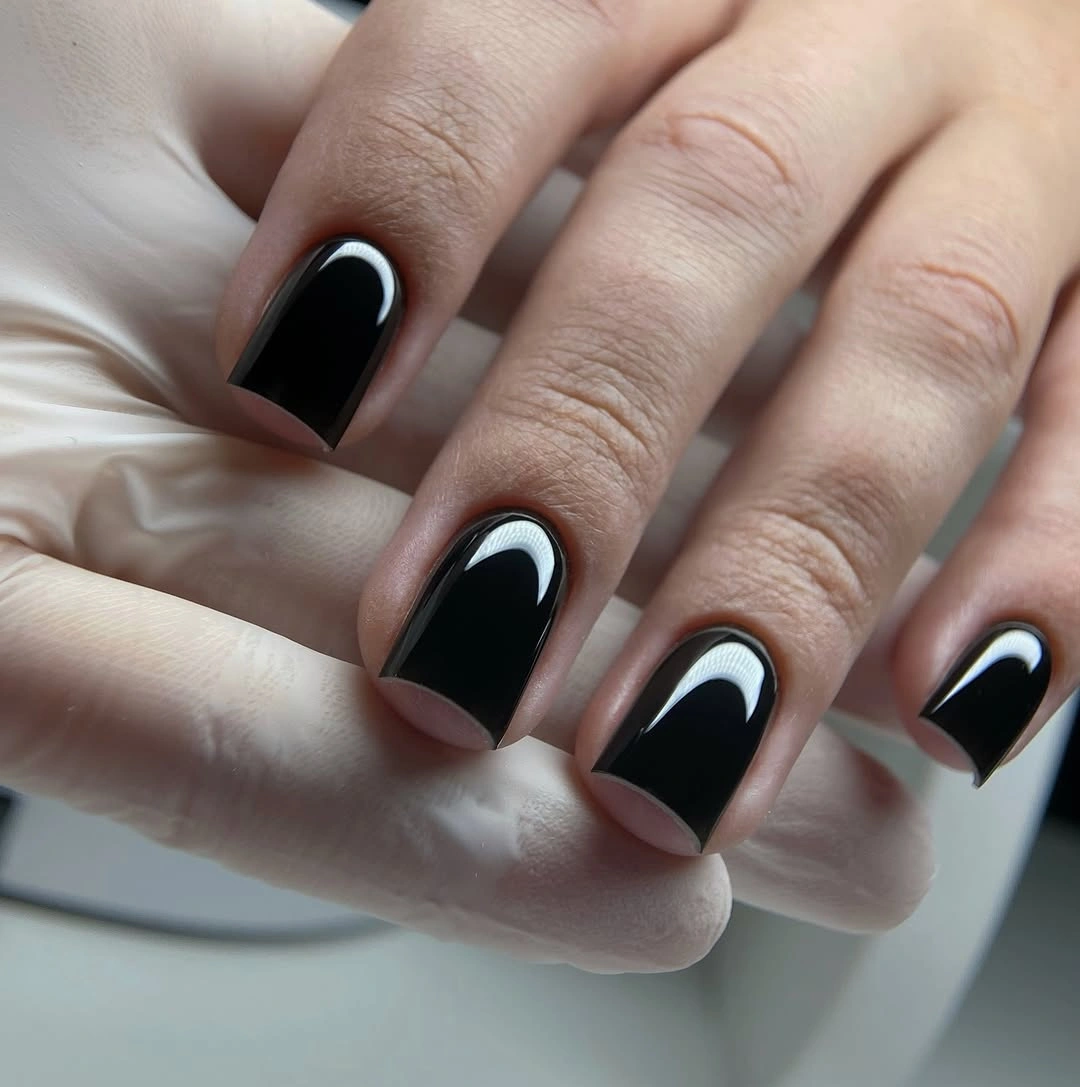 Medium square nails with an opaque high gloss black finish