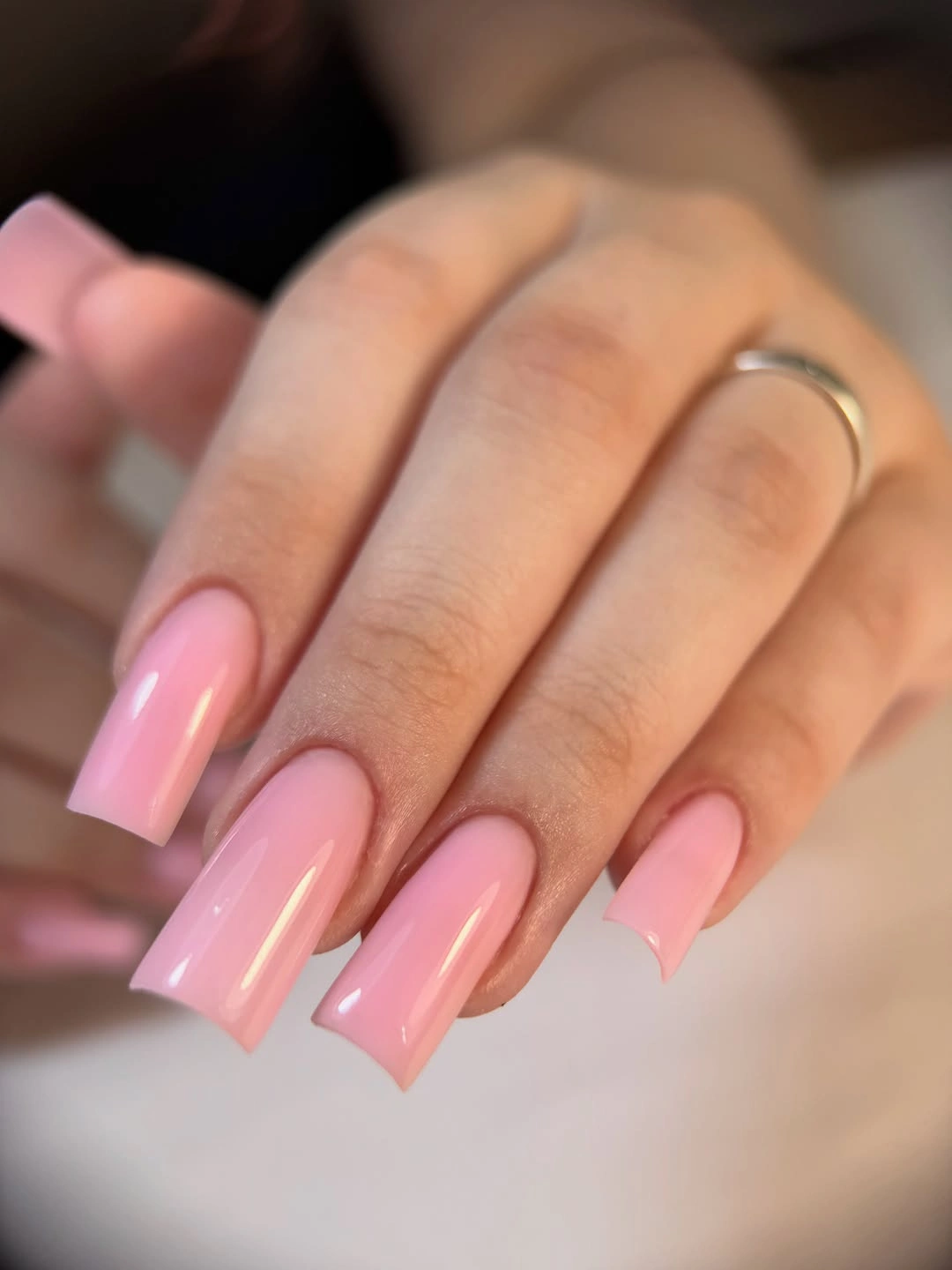 Long square nails in vivid glossy bright pink