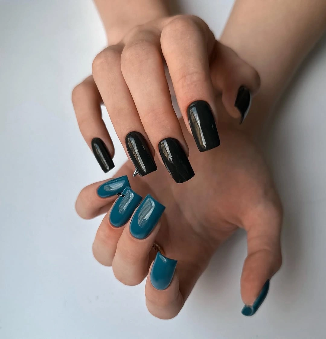 Medium square nails alternating glossy black and deep teal