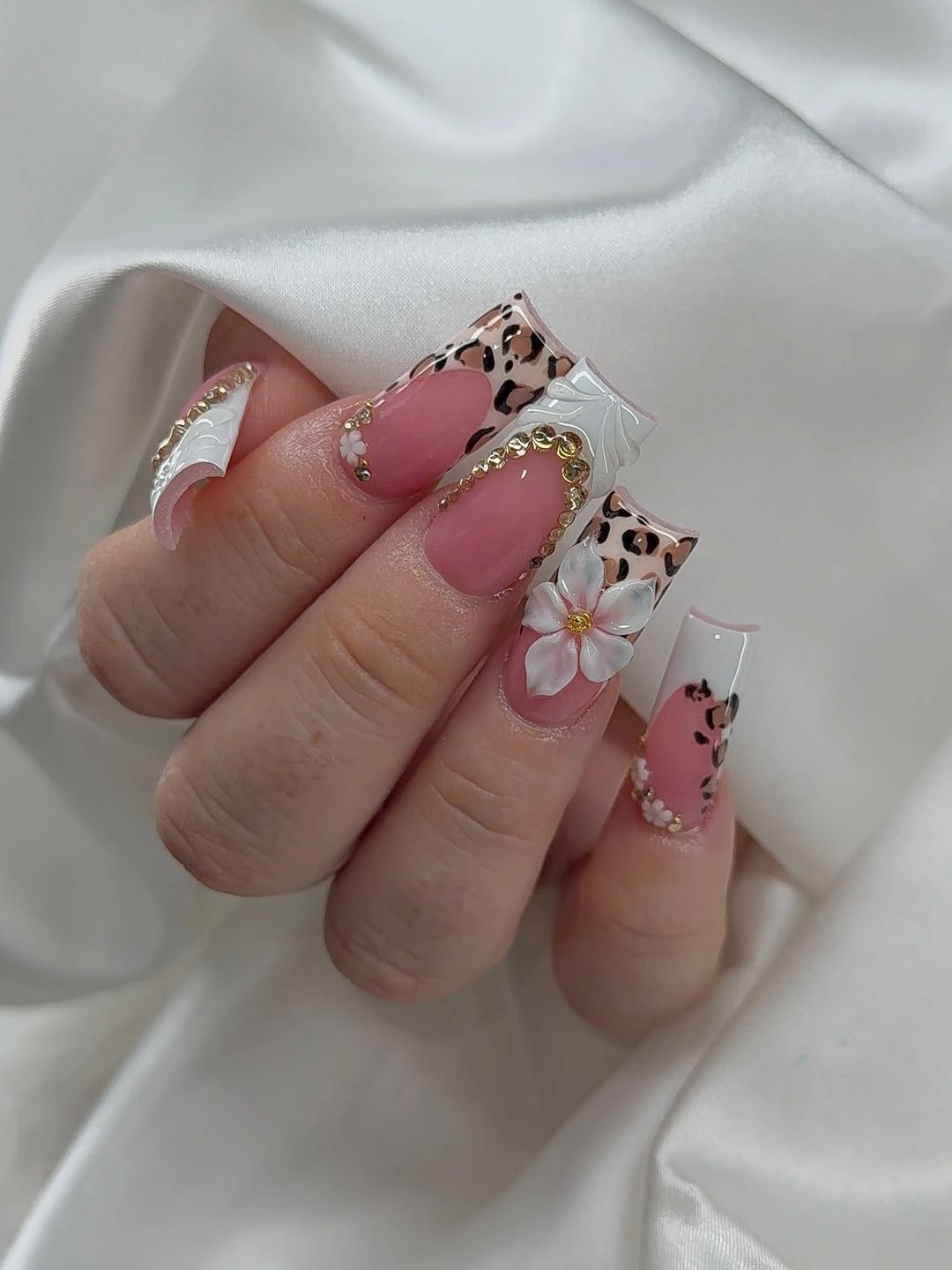 Leopard square tips with white floral nail detail