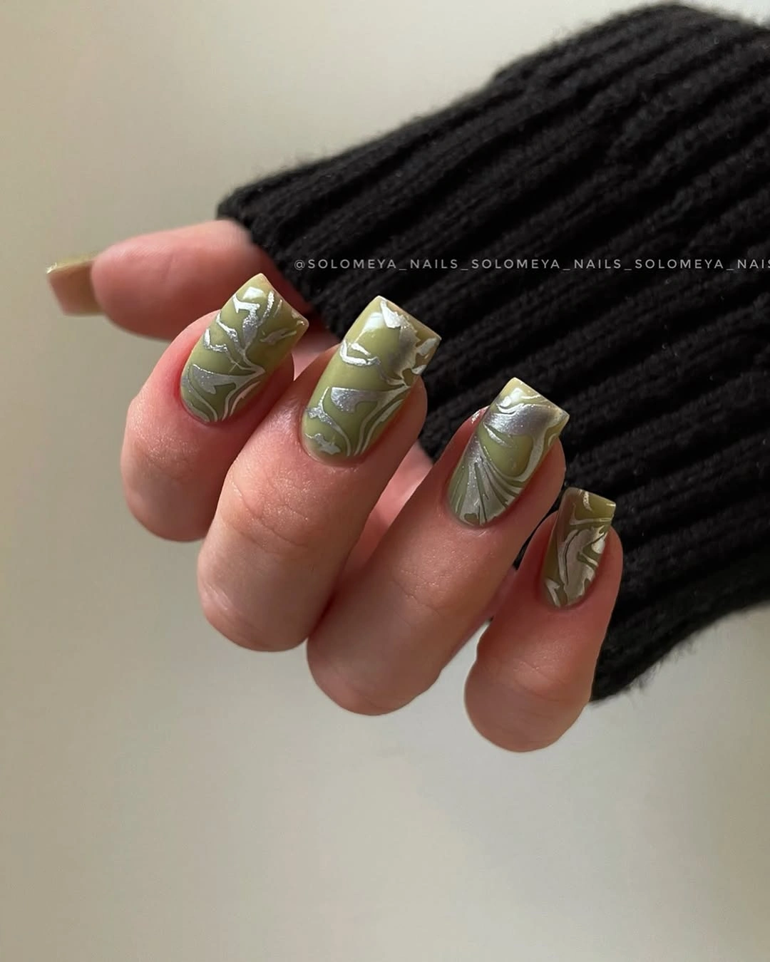 Long olive square nails with raised metallic leaf details