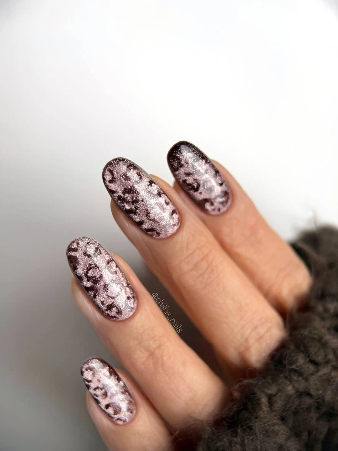 Medium almond nails with mauve brown and cream marbling