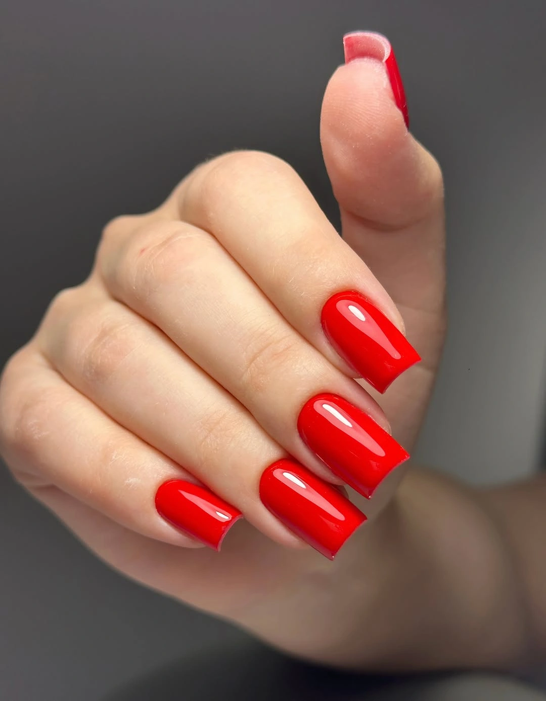 medium square nails painted glossy saturated bright red
