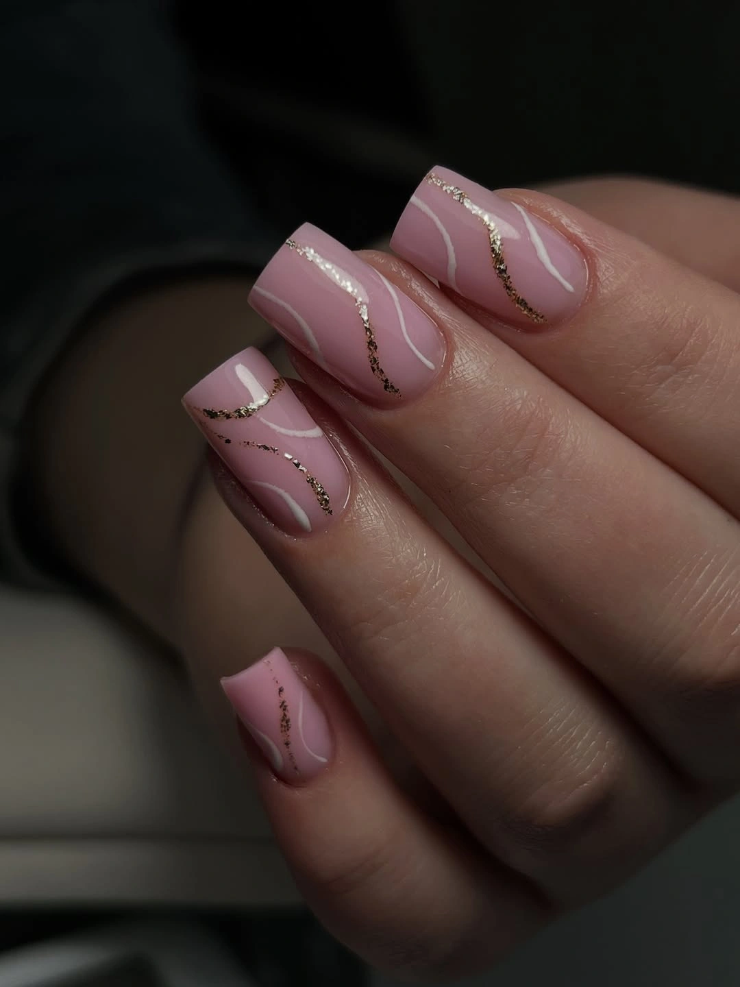 Soft pink square nails with gold curves
