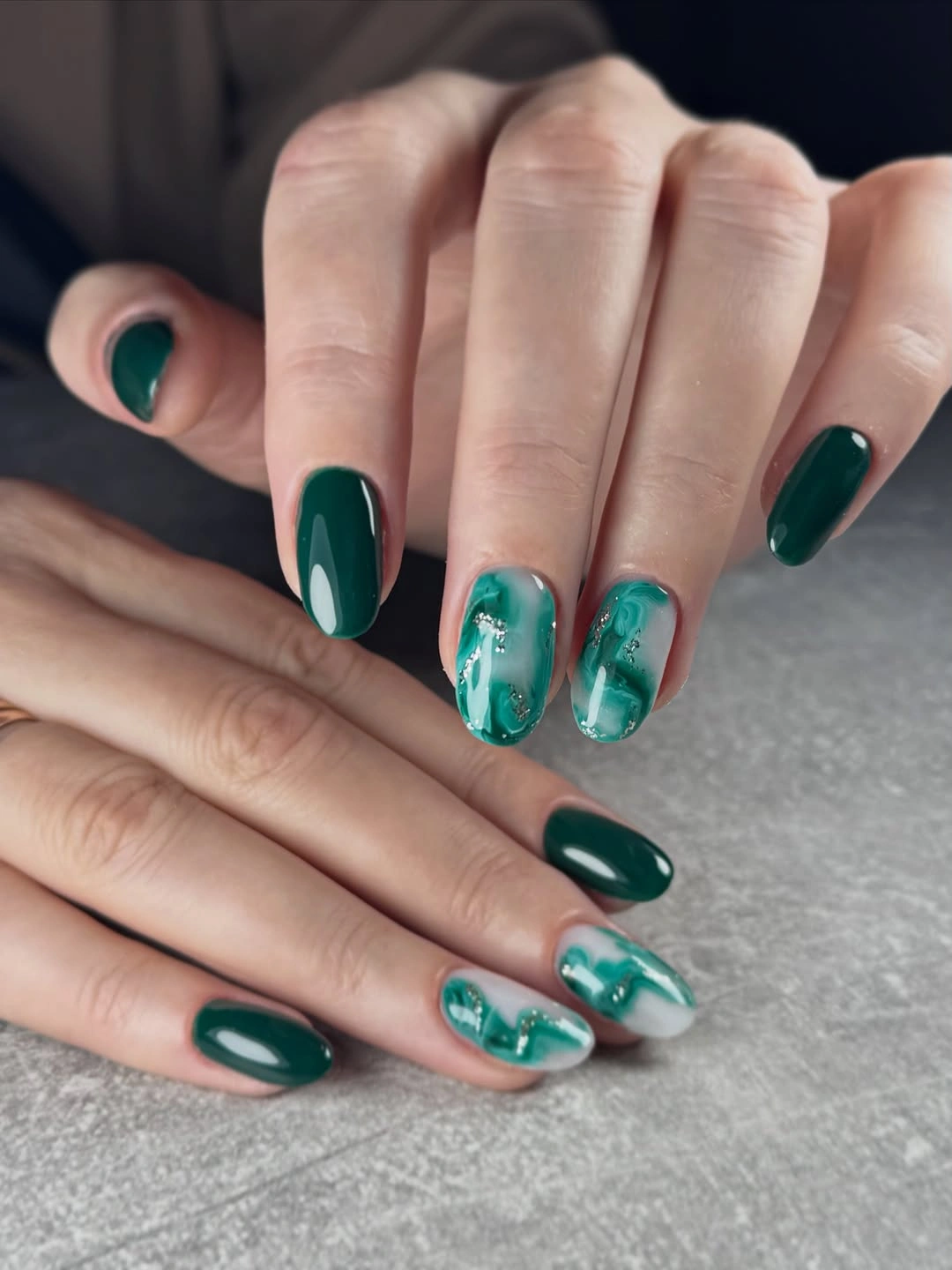 Emerald nails with green marble accent art
