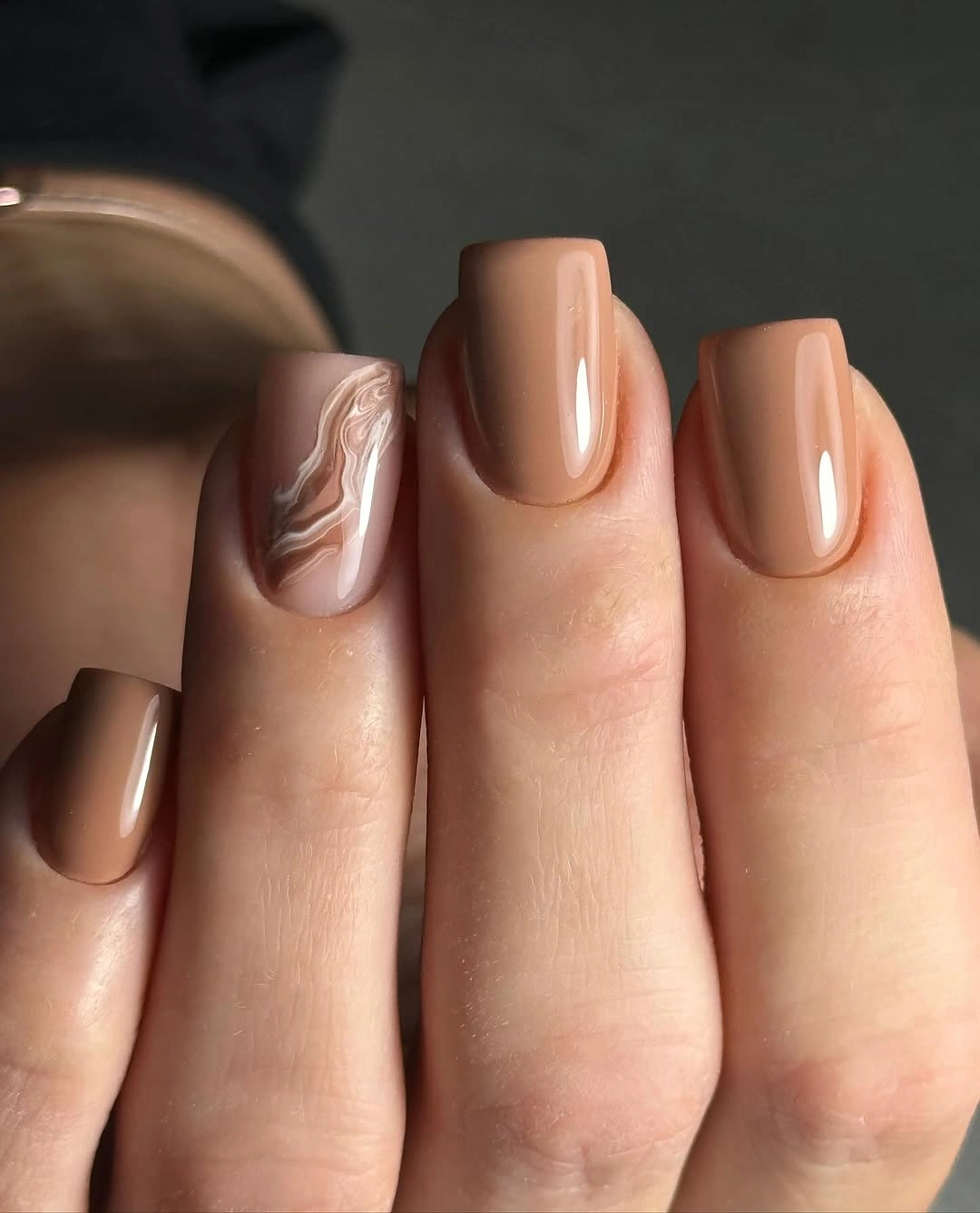 Caramel neutral nails with marble accent