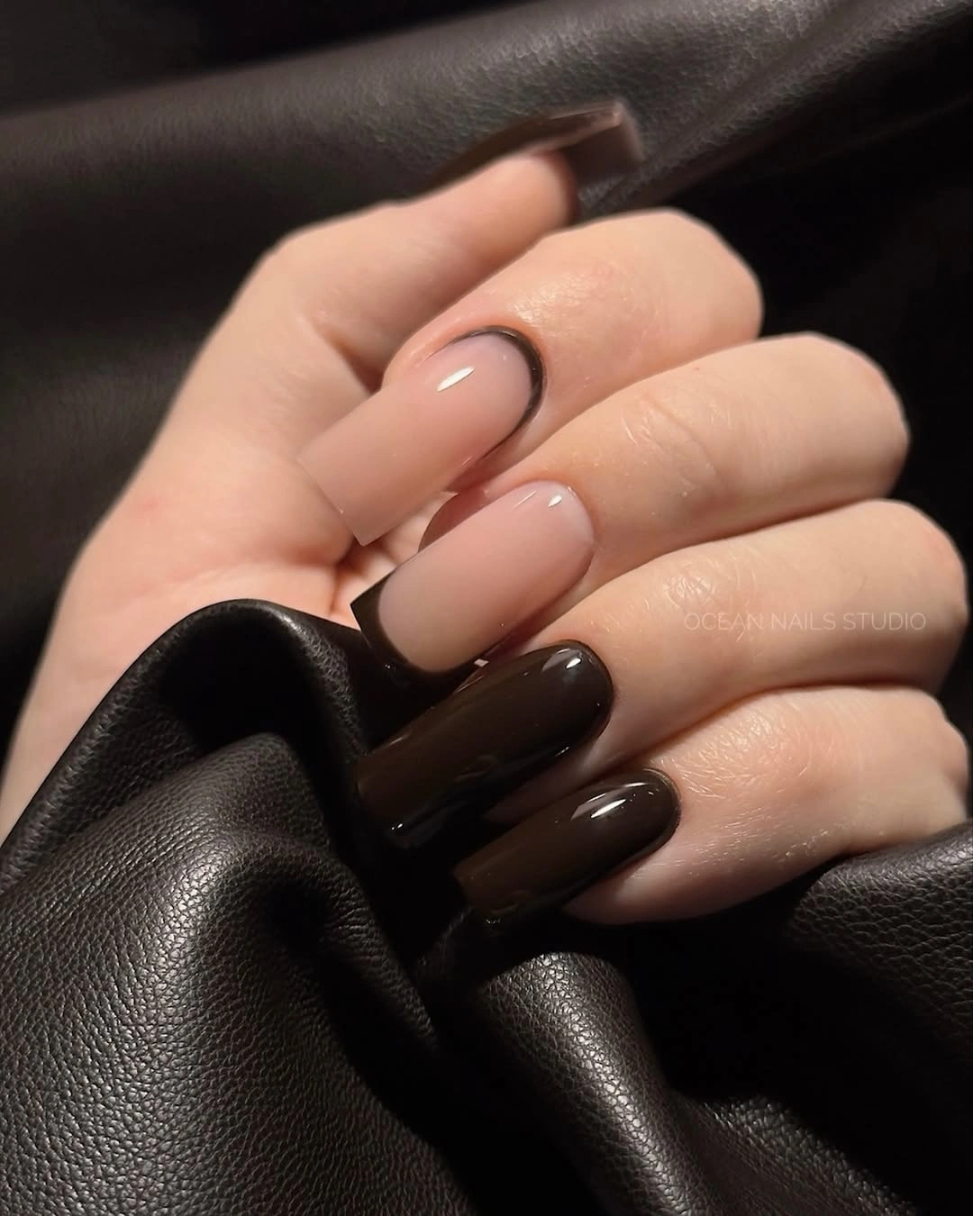 medium almond nails in glossy deep chocolate brown