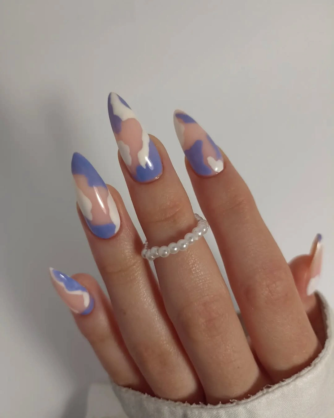 long almond nails with lavender blue and peach curved panels